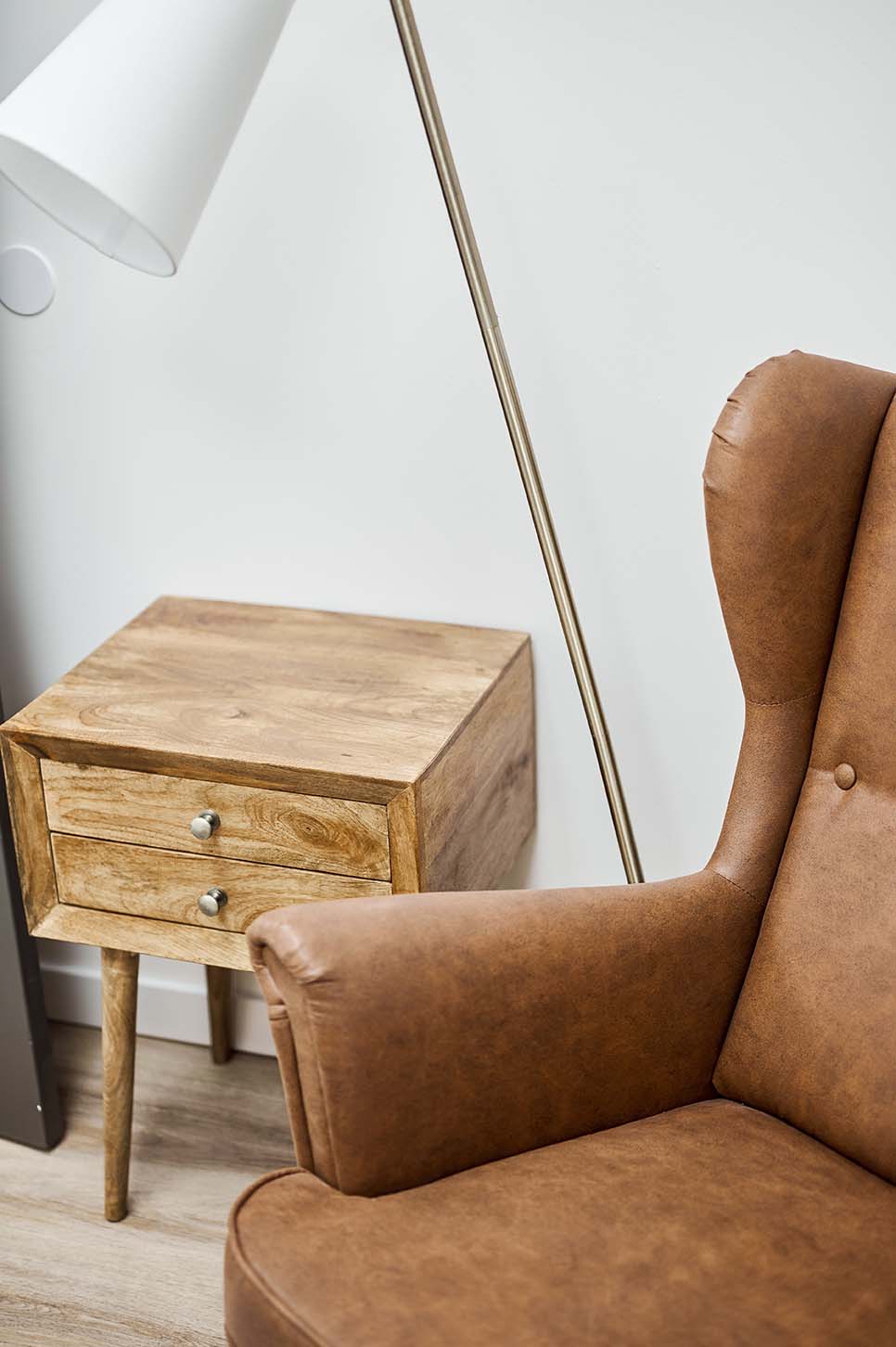 brown-coffee-table-beside-lampshade-sofa-integrated-internal-medicine-queens-ny